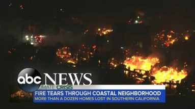 Fire tears through coastal neighborhood