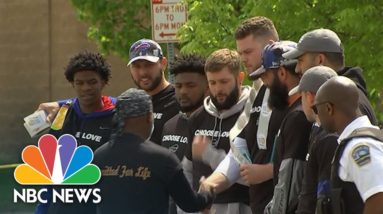 Buffalo Bills Visit Tops Grocery Store To Pay Their Respects To Shooting Victims