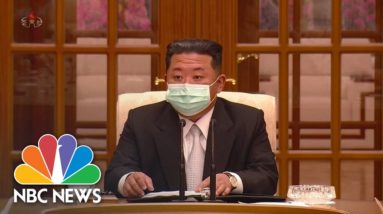 North Korea's Kim Wears Face Mask As First Covid Cases Acknowledged