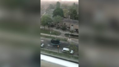 Trampoline flies down Toronto street during storm