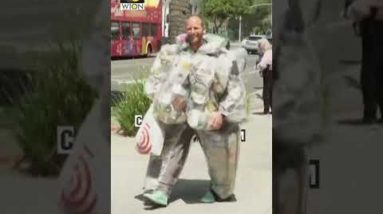 Why this man in Los Angeles wearing a garbage suit? | WION Shorts