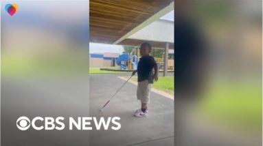 Dad surprises his visually impaired son at school