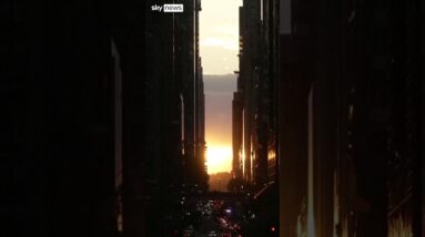 Crowds gathered in New York to watch the bi-annual 'Manhattanhenge' sunset