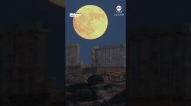 Full moon rises behind ancient Greek temple - ABC News