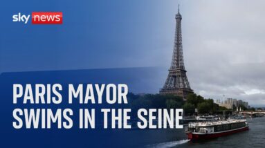 Watch live: Paris Mayor swims in the Seine after criticism of water quality