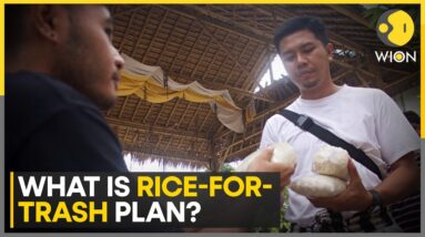 Philippine town swaps trash for rice to clean up its beaches | Latest News | WION