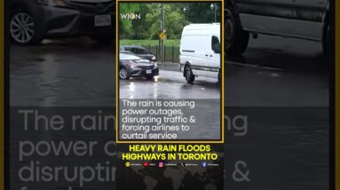 Torrential rains flood Toronto, causing power outages, traffic disruption