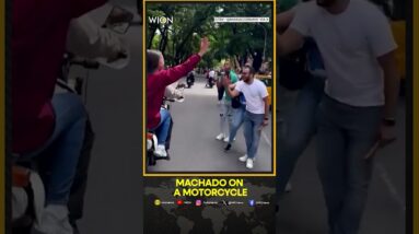 Supporters cheer Machado as she tours Caracas on a motorcycle | WION Shorts