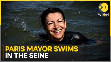 Paris Mayor swims in Seine as city cleans up river for Olympics | Latest News | WION