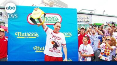 Reigning champ gets removed from Nathan's Hot Dog eating contest