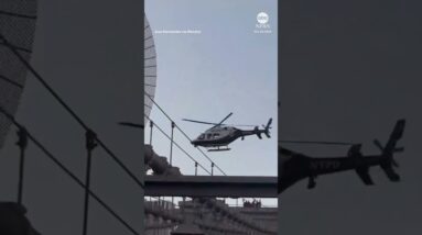 Police helicopter hover near people on top of Brooklyn Bridge - ABC News