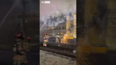 Train fire shuts down roads in downtown Las Vegas