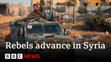 Thousands flee Syrian city Homs as rebels advance further | BBC News